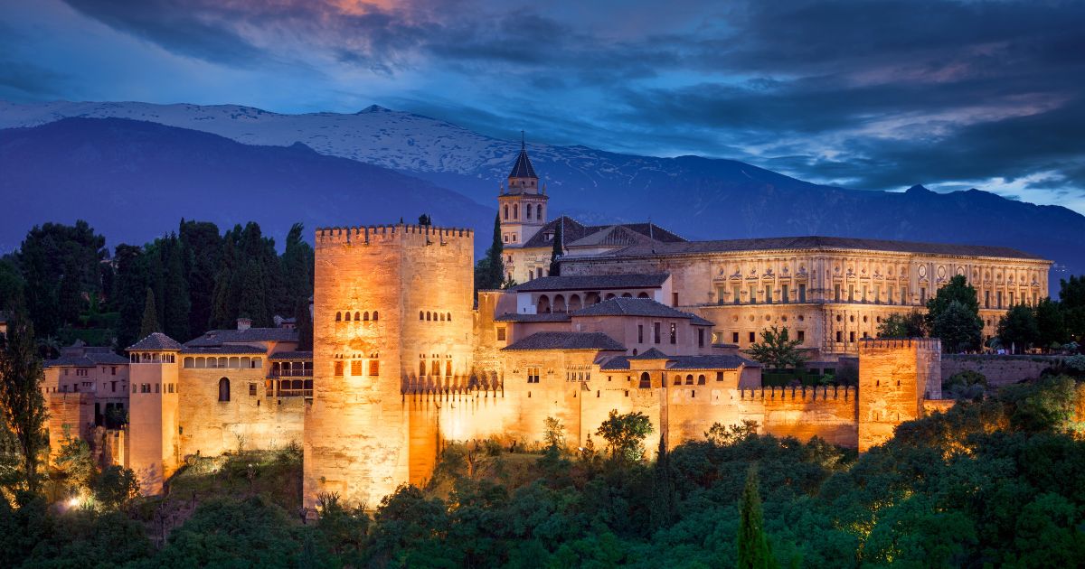 view of Alhambra at night for castles in spain post